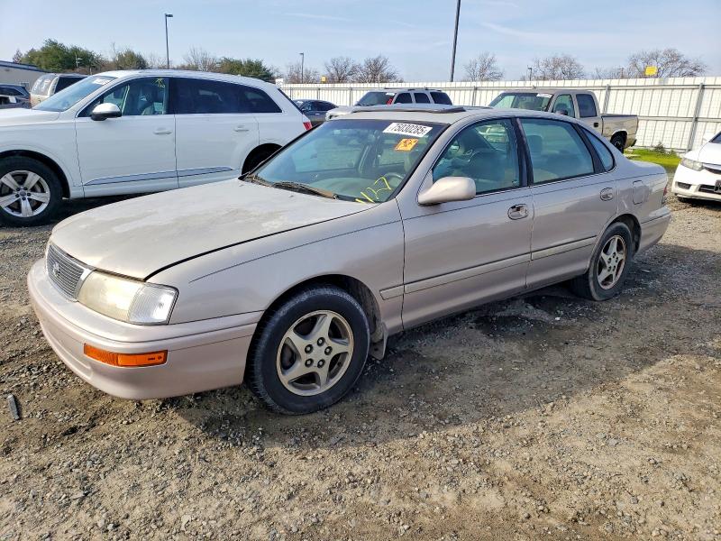 TOYOTA AVALON 1997 with VIN 4T1BF12B4VU189338 - Photo from auction