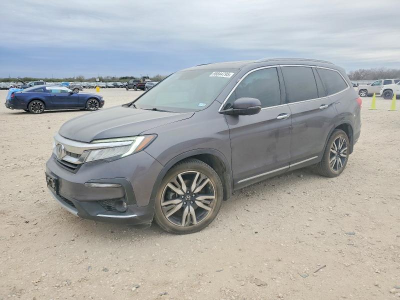 Photo 1 from auction – 2022 HONDA PILOT TOUR with VIN 5FNYF5H92NB006599