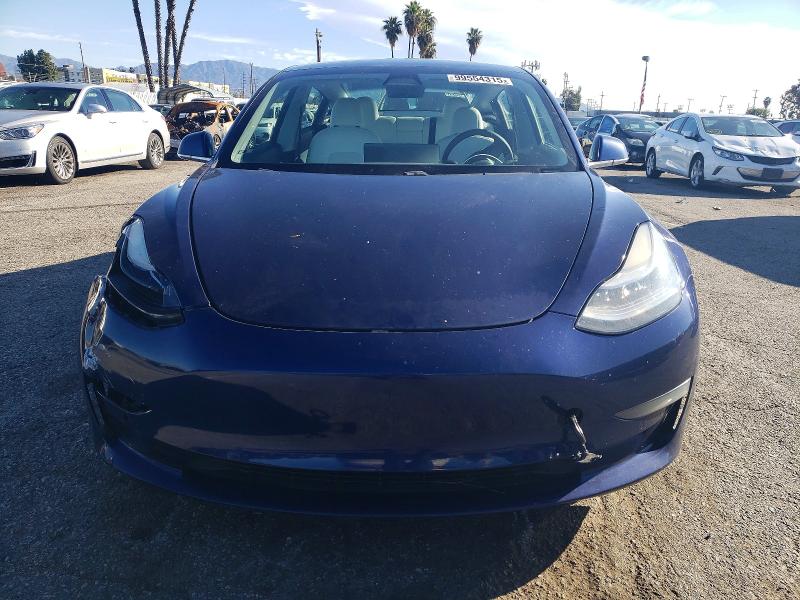 Photo 5 from auction – 2020 TESLA MODEL 3 with VIN 5YJ3E1EA3LF797713