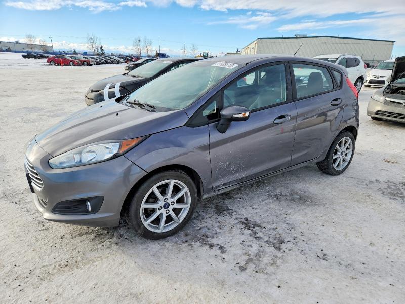 FORD FIESTA SE 2014 with VIN 3FADP4EJ7EM238086 - Photo from auction