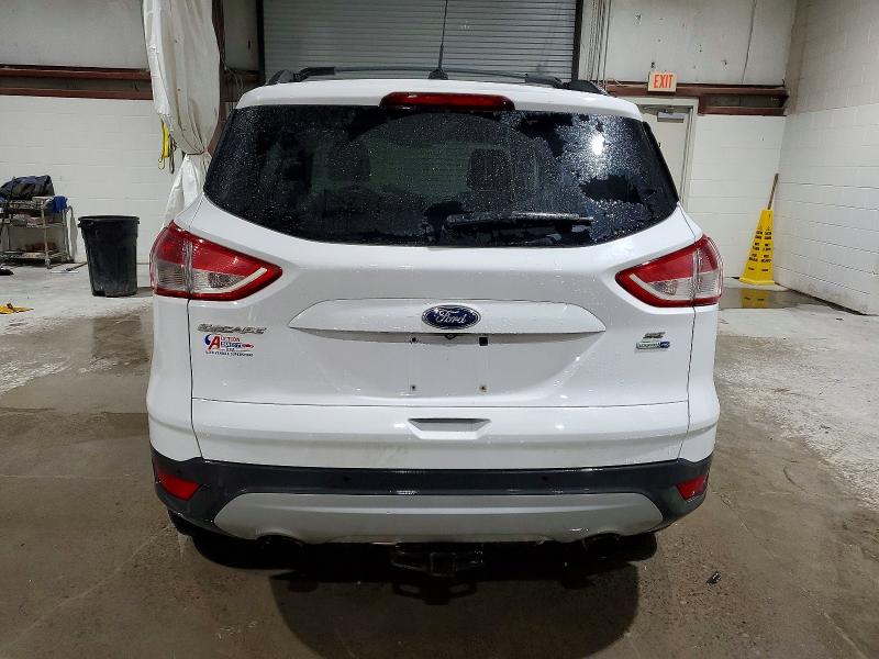 Photo 6 from auction – 2014 FORD ESCAPE SE with VIN 1FMCU9G9XEUA73558