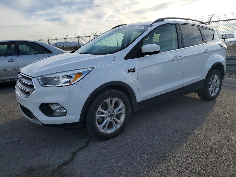 FORD ESCAPE SE 2018 with VIN 1FMCU0GDXJUA74056 - Photo from auction