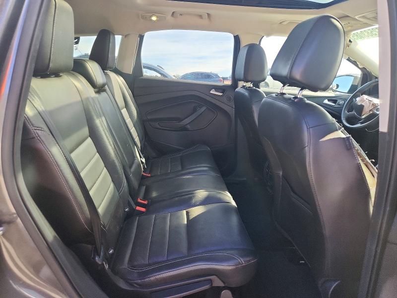Photo 11 from auction – 2016 FORD ESCAPE TIT with VIN 1FMCU9J95GUA01341