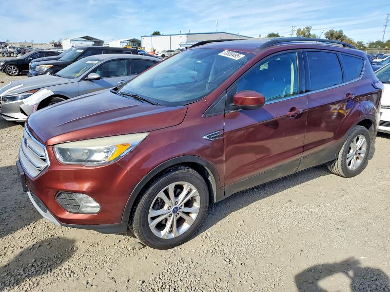 FORD ESCAPE SE 2018 with VIN 1FMCU0GD2JUA04695 - Photo from auction
