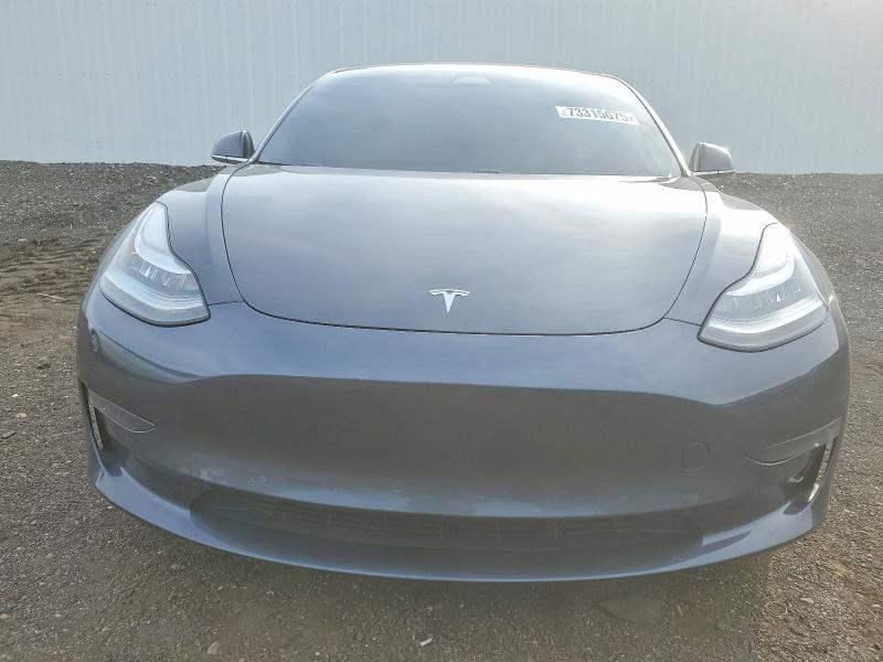 Photo 5 from auction – 2018 TESLA MODEL 3 with VIN 5YJ3E1EA8JF058690