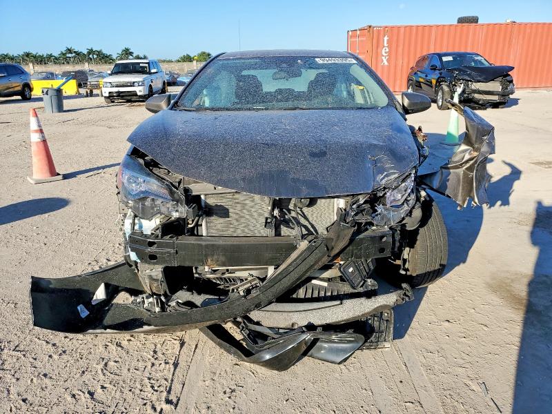 Photo 5 from auction – 2017 TOYOTA COROLLA L with VIN 5YFBURHEXHP662932
