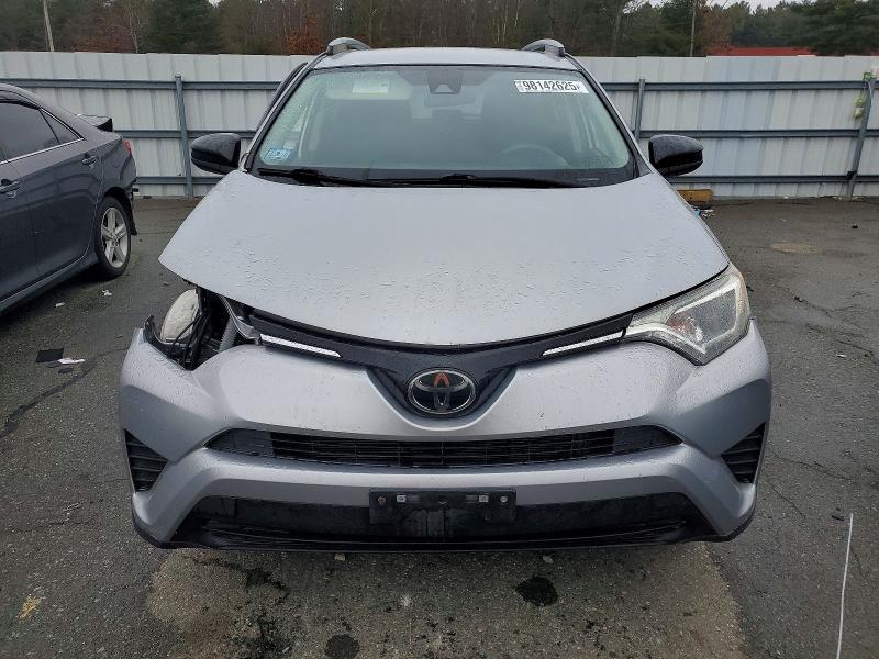 Photo 5 from auction – 2018 TOYOTA RAV4 LE with VIN JTMBFREV8JJ236147