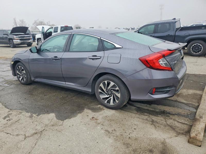 Photo 2 from auction – 2017 HONDA CIVIC LX with VIN 2HGFC2F51HH517851