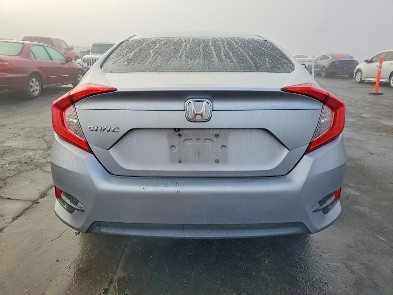 Photo 6 from auction – 2017 HONDA CIVIC LX with VIN 2HGFC2F58HH562723