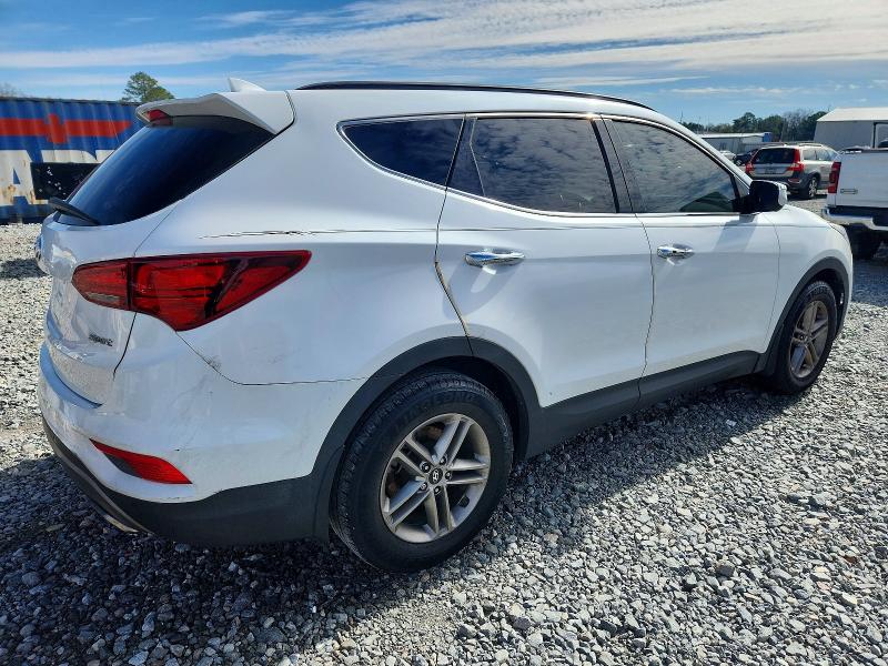 Photo 3 from auction – 2018 HYUNDAI SANTA FE S with VIN 5NMZU3LB9JH097761