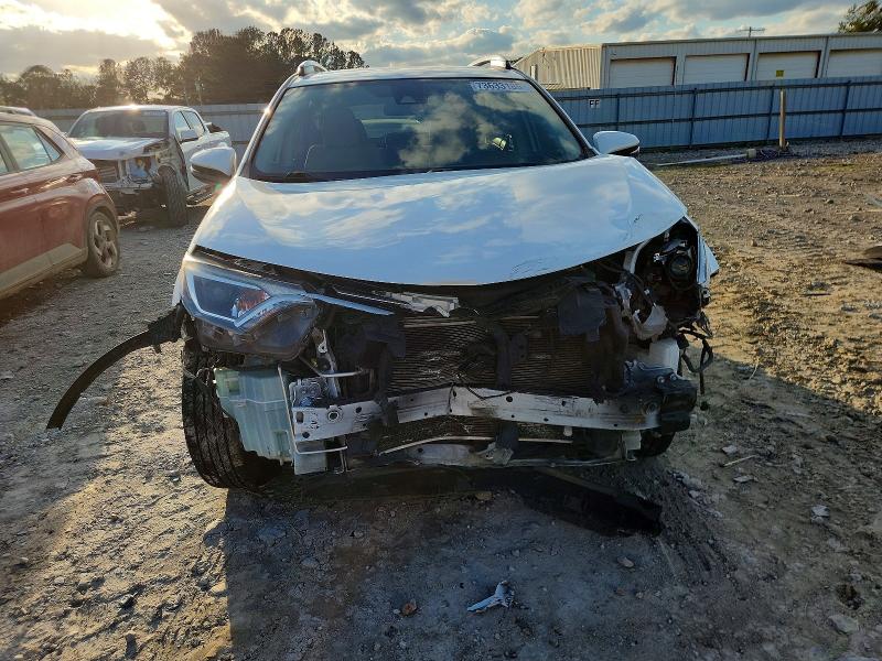 Photo 5 from auction – 2017 TOYOTA RAV4 XLE with VIN JTMWFREVXHJ701054