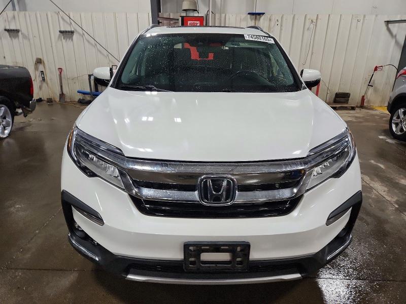 Photo 5 from auction – 2022 HONDA PILOT TOUR with VIN 5FNYF6H62NB098518