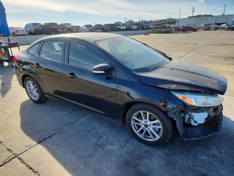 Photo 4 from auction – 2016 FORD FOCUS with VIN 1FADP3F20GL372038