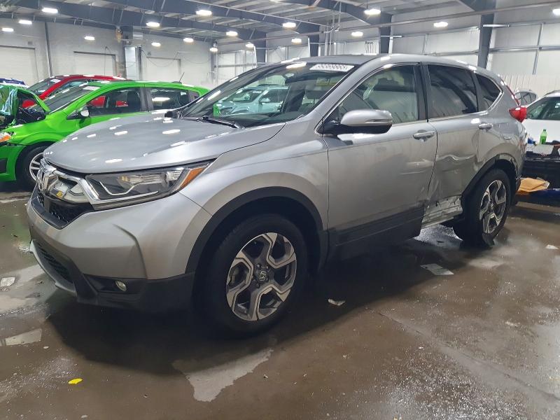 HONDA CR-V EX 2018 with VIN 7FARW2H5XJE047884 - Photo from auction