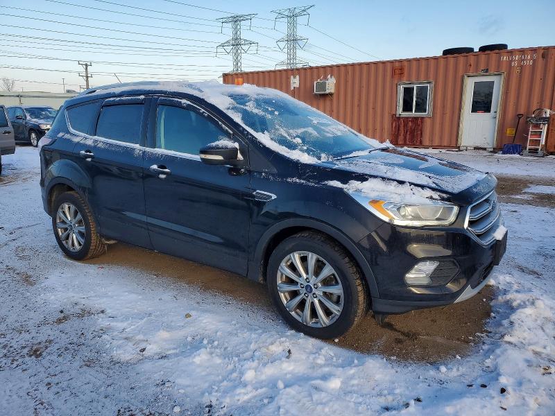 Photo 4 from auction – 2017 FORD ESCAPE TIT with VIN 1FMCU9JD9HUE96195