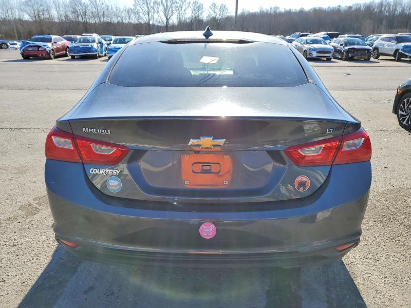 Photo 6 from auction – 2017 CHEVROLET MALIBU with VIN 1G1ZE5ST0HF105359