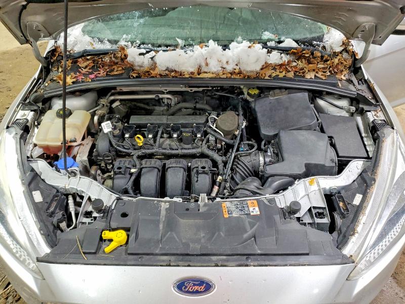 Photo 11 from auction – 2015 FORD FOCUS with VIN 1FADP3F24FL355533