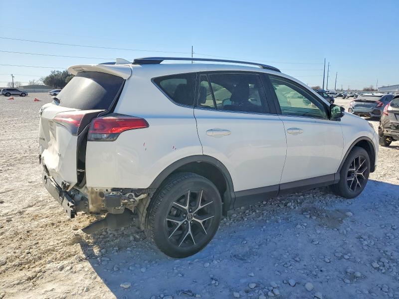 Photo 3 from auction – 2017 TOYOTA RAV4 SE with VIN JTMNFREV4HJ718234