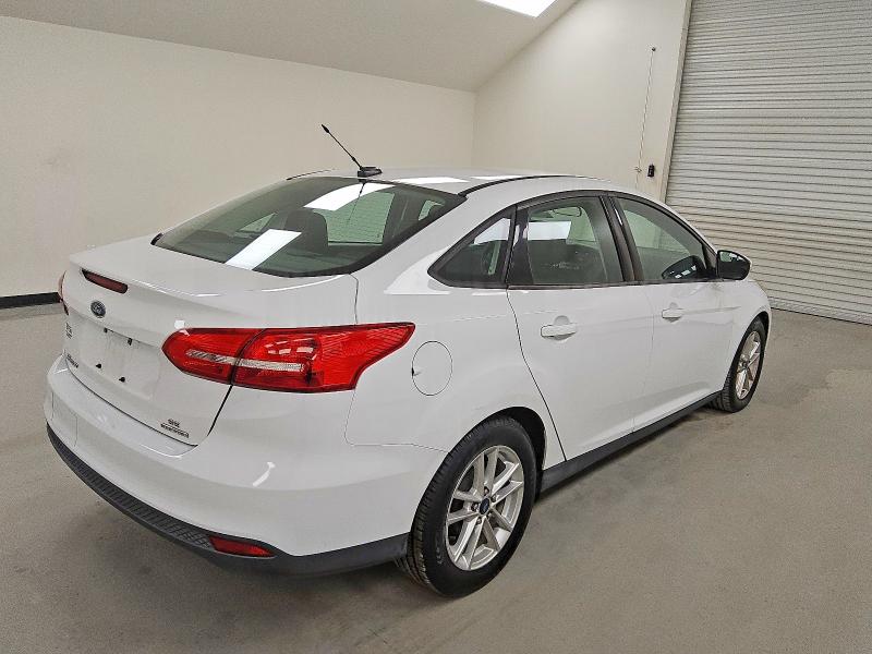 Photo 3 from auction – 2016 FORD FOCUS SE with VIN 1FADP3F2XGL215892