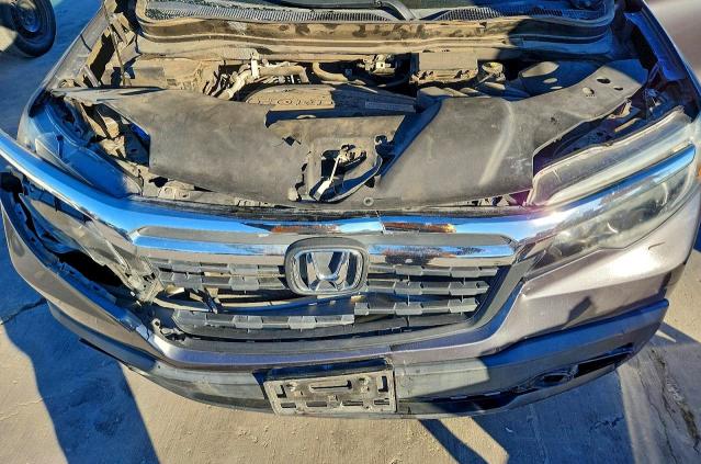 Photo 11 from auction – 2017 HONDA RIDGELINE with VIN 5FPYK3F59HB013609