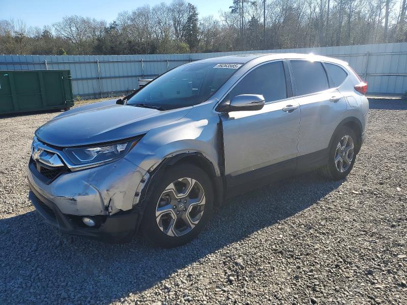 Photo 1 from auction – 2018 HONDA CR-V with VIN 7FARW1H89JE000575