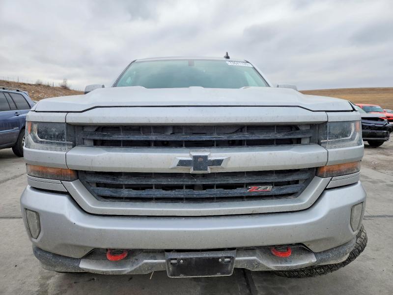 Photo 5 from auction – 2018 CHEVROLET SILVERADO with VIN 3GCUKREC1JG538190