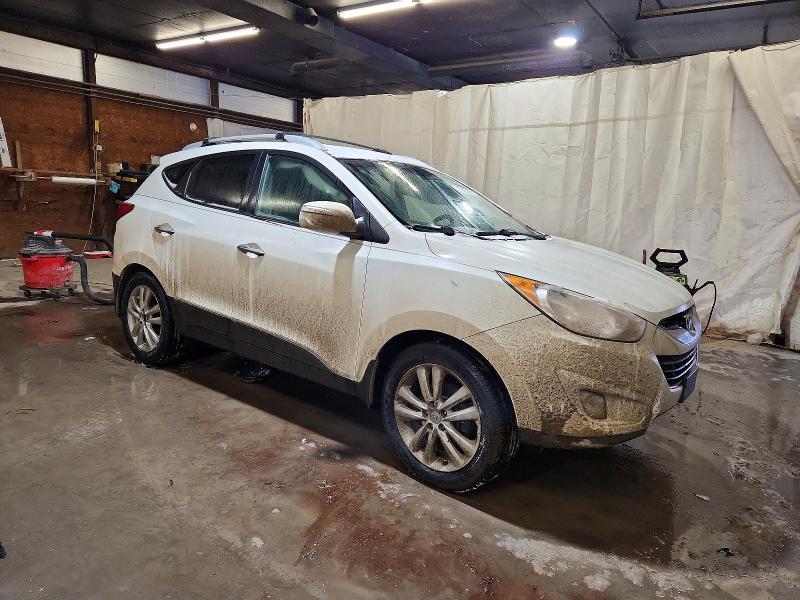 Photo 4 from auction – 2012 HYUNDAI TUCSON with VIN KM8JU3AC2CU389090