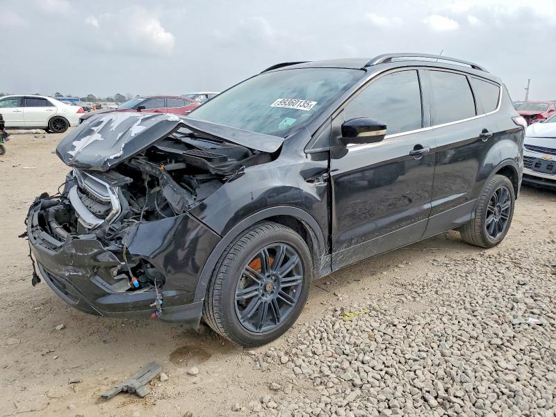 FORD ESCAPE TIT 2017 with VIN 1FMCU0JD5HUD04489 - Photo from auction
