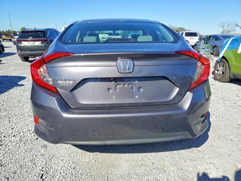 Photo 6 from auction – 2016 HONDA CIVIC LX with VIN 19XFC2F50GE037857
