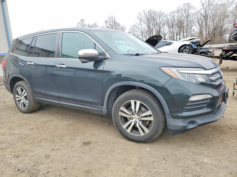 Photo 4 from auction – 2016 HONDA PILOT with VIN 5FNYF6H57GB094023