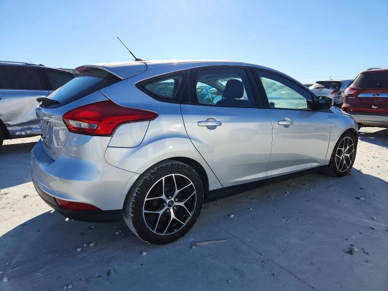 Photo 3 from auction – 2015 FORD FOCUS SE with VIN 1FADP3K23FL272746