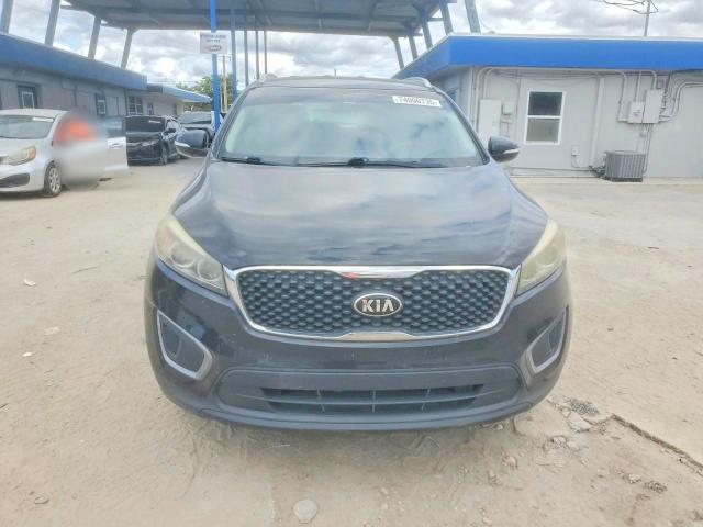 Photo 5 from auction – 2016 KIA SORENTO LX with VIN 5XYPG4A36GG107973