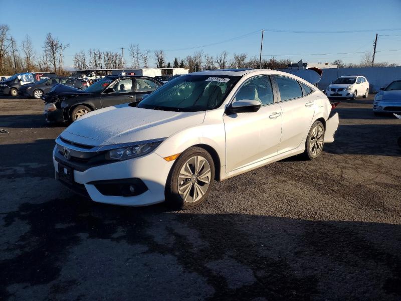 HONDA CIVIC EX 2016 with VIN 19XFC1F49GE214326 - Photo from auction