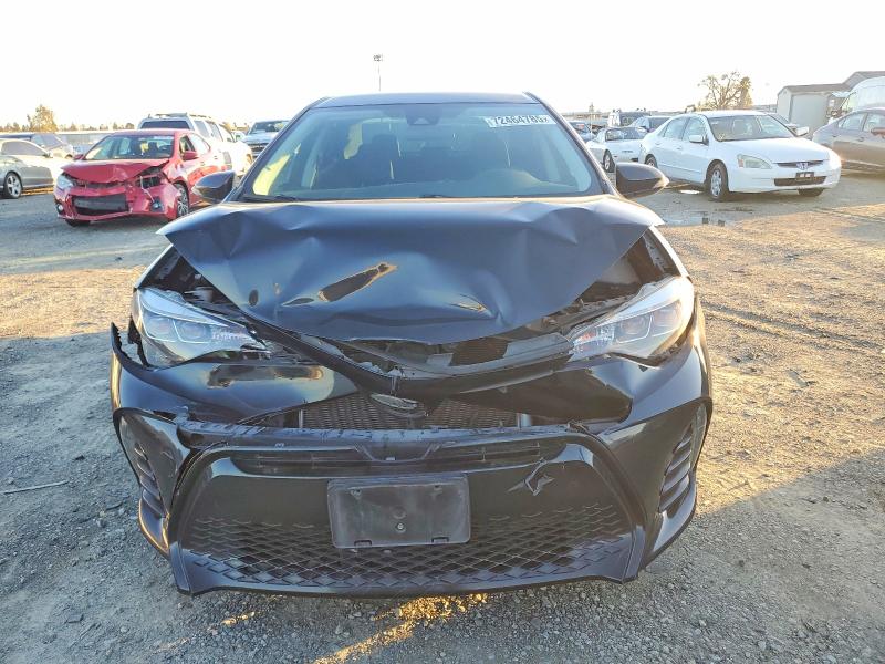 Photo 5 from auction – 2019 TOYOTA COROLLA L with VIN 2T1BURHE4KC185471