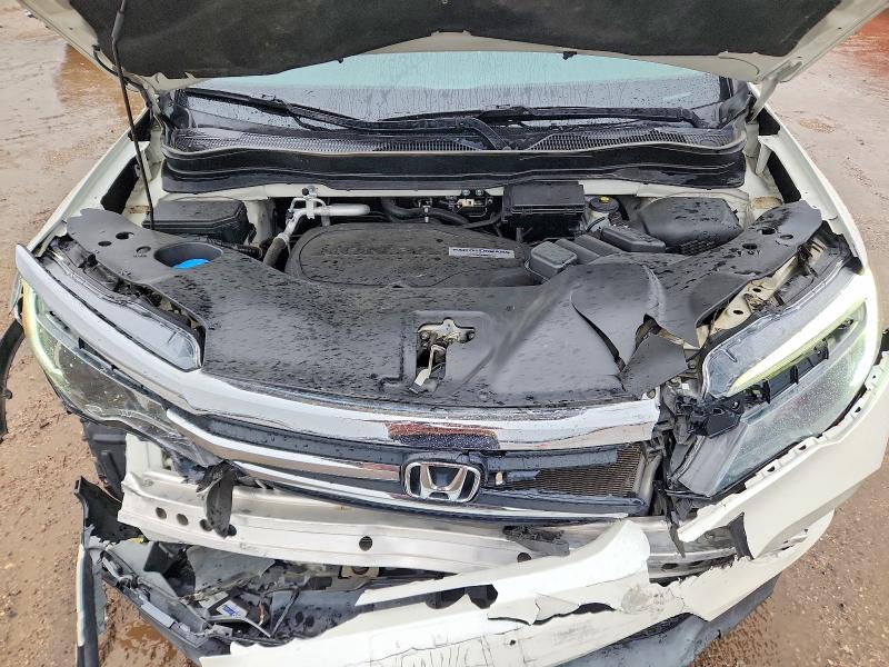 Photo 12 from auction – 2017 HONDA PILOT with VIN 5FNYF5H56HB044273