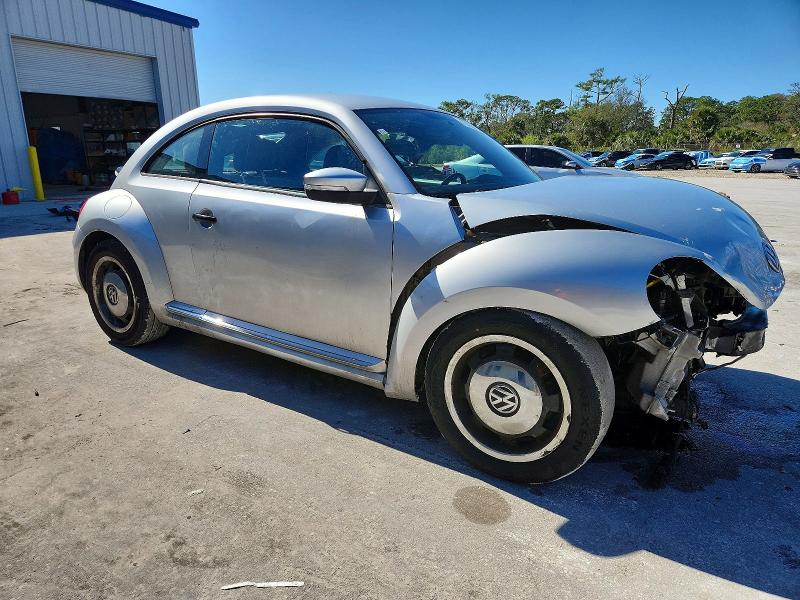 Photo 4 from auction – 2015 VOLKSWAGEN BEETLE with VIN 3VWF17AT1FM651990