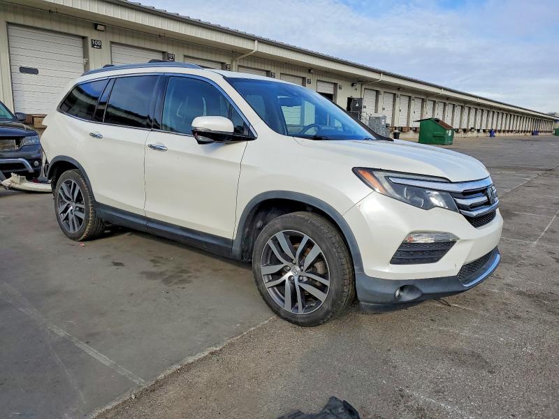 Photo 4 from auction – 2017 HONDA PILOT TOUR with VIN 5FNYF6H9XHB064762