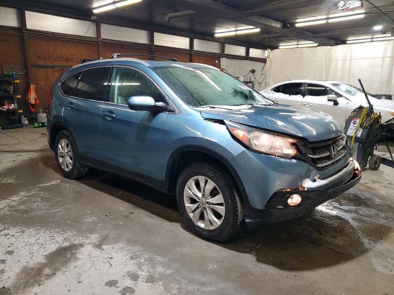 Photo 4 from auction – 2014 HONDA CR-V EXL with VIN 2HKRM4H70EH690900