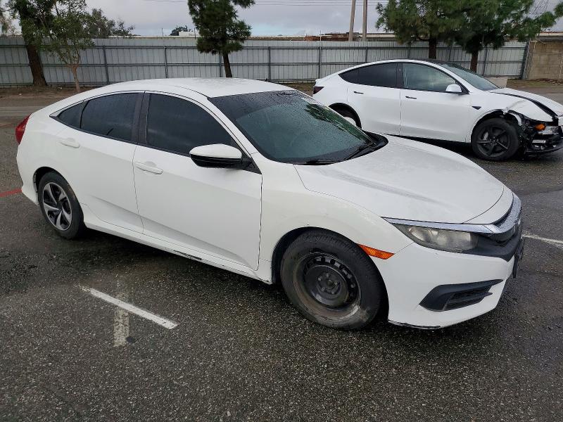 Photo 4 from auction – 2017 HONDA CIVIC LX with VIN 2HGFC2F5XHH536754