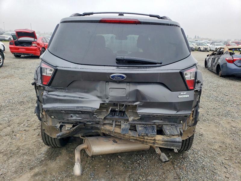 Photo 6 from auction – 2018 FORD ESCAPE SE with VIN 1FMCU9GD2JUA87341