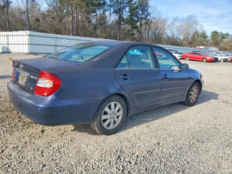 Photo 3 from auction – 2002 TOYOTA CAMRY LE with VIN 4T1BF30K02U540076