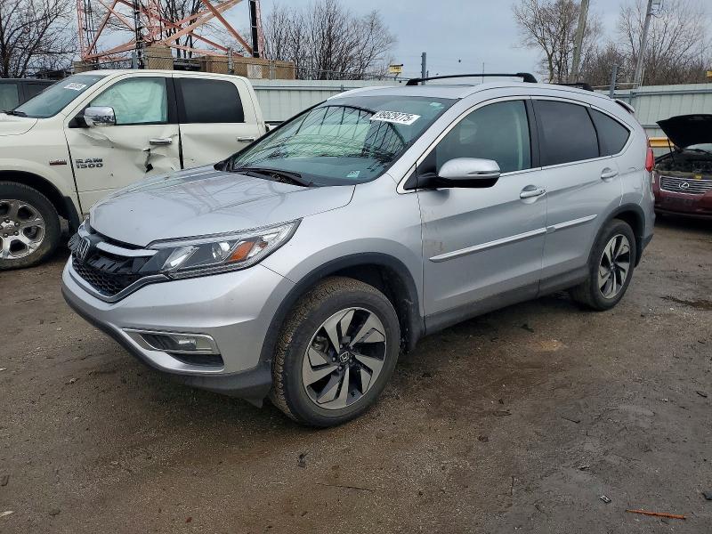 Photo 1 from auction – 2015 HONDA CR-V TOURI with VIN 5J6RM4H96FL108405