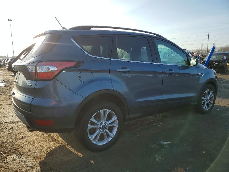Photo 3 from auction – 2018 FORD ESCAPE with VIN 1FMCU0GD0JUA52292