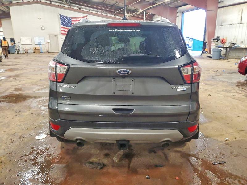 Photo 6 from auction – 2018 FORD ESCAPE with VIN 1FMCU9J96JUA41421