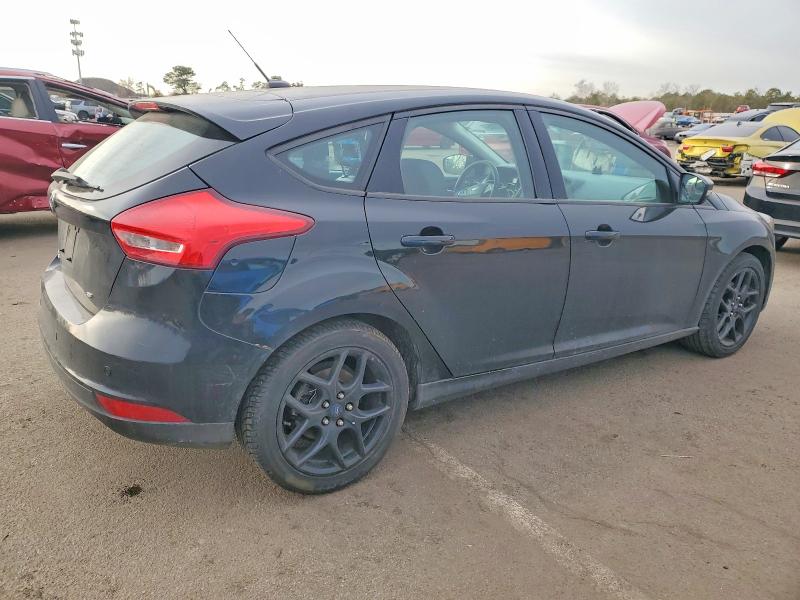 Photo 3 from auction – 2016 FORD FOCUS SE with VIN 1FADP3K25GL330633
