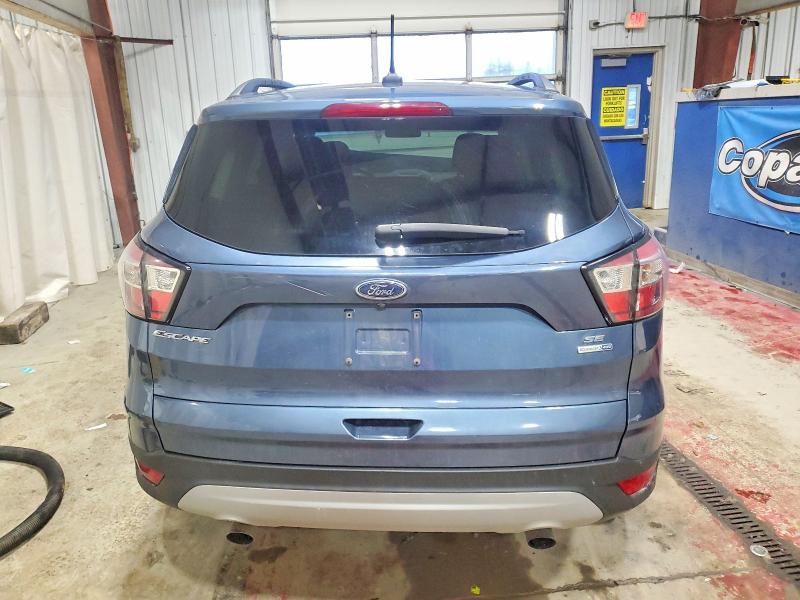 Photo 6 from auction – 2018 FORD ESCAPE SE with VIN 1FMCU9GDXJUB40982