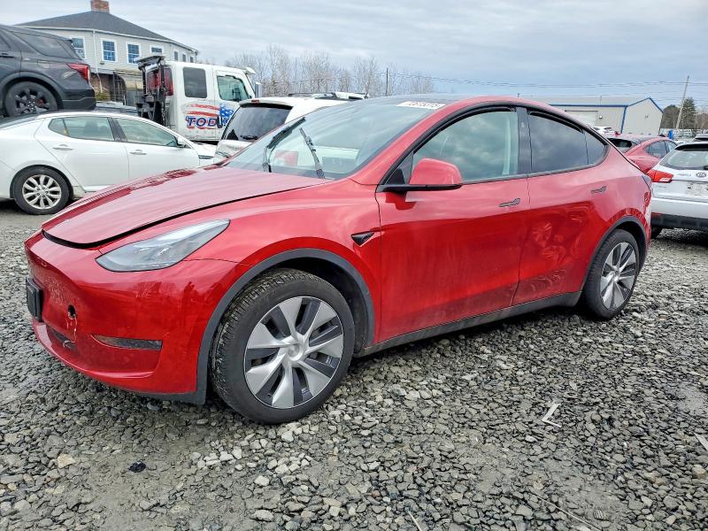 TESLA MODEL Y 2023 with VIN 7SAYGDEE6PA210401 - Photo from auction