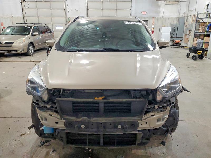 Photo 5 from auction – 2018 FORD ESCAPE with VIN 1FMCU0J90JUC06522