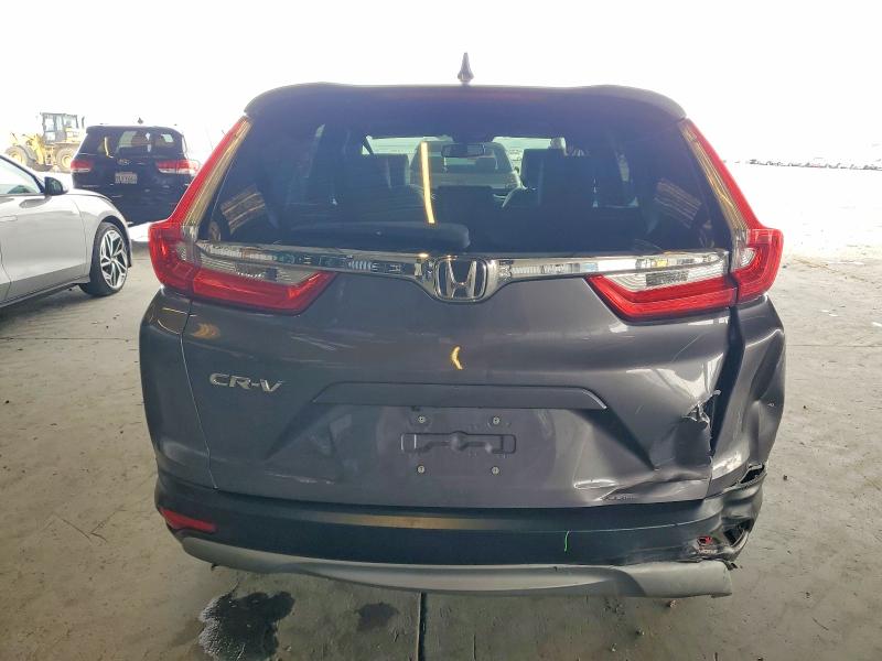 Photo 6 from auction – 2018 HONDA CR-V with VIN 7FARW1H87JE034210