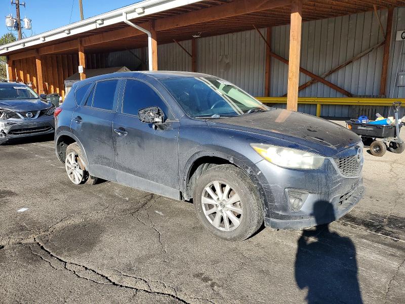 Photo 4 from auction – 2014 MAZDA CX-5 with VIN JM3KE4CY8E0332365